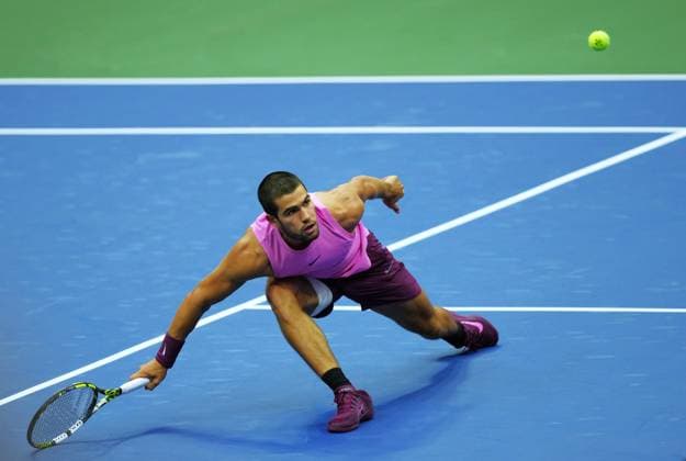 (250908) -- NEW YORK, Sept. 8, 2025 -- Carlos Alcaraz of Spain hits a return during the men s singles final match between Carlos Alcaraz of Spain and Jannik Sinner of Italy at the 2025 US Open tennis championships in New York, the United States, Sept. 7, 2025. ) (SP)U.S.-NEW YORK-TENNIS-US OPEN-MEN S SINGLES-FINAL WuxXiaoling 
