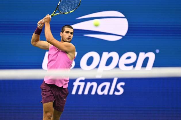 (250908) -- NEW YORK, Sept. 8, 2025 -- Carlos Alcaraz of Spain hits a return during the men s singles final match between Carlos Alcaraz of Spain and Jannik Sinner of Italy at the 2025 US Open tennis championships in New York, the United States, Sept. 7, 2025. ) (SP)U.S.-NEW YORK-TENNIS-US OPEN-MEN S SINGLES-FINAL LixRui 