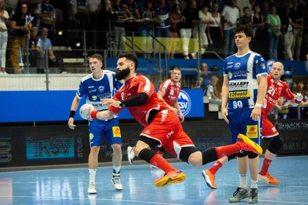 Eisenach , 070925 , 1 Handball Bundesliga THSV Eisenach vs MT Melsungen In the picture Ruben Marchan Melsungen vs Tillmann Leu Eisenach