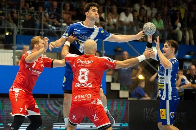 Eisenach , 070925 , 1 Handball Bundesliga THSV Eisenach vs MT Melsungen In the picture Dainis Kristopans and Adrian Sipos Melsungen vs Stephan Seitz and Felix Aelen Eisenach