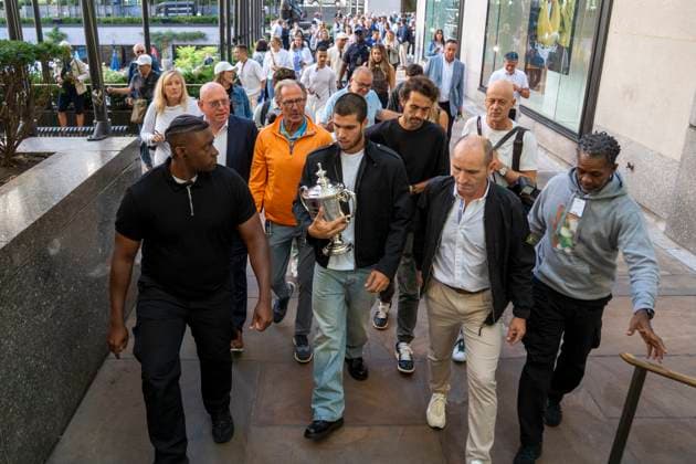 Spanish tennis player Carlos Alcaraz (C) walks with the trophy that certifies him as the 2025 US Open champion at Rockefeller Center in New York City, USA 08 September 2025. With the US Open trophy in his hands and reinstated as world number one two years later, Carlos Alcaraz explained in an interview with EFE that his immediate goal is to complete the Grand Slam. I have Australia in my sights, said the Spanish tennis player. Alcaraz: I have Australia in my sights !ACHTUNG: NUR REDAKTIONELLE NUTZUNG!  Copyright: xAngelxColmenaresx AME7446 20250908-55017861815_1