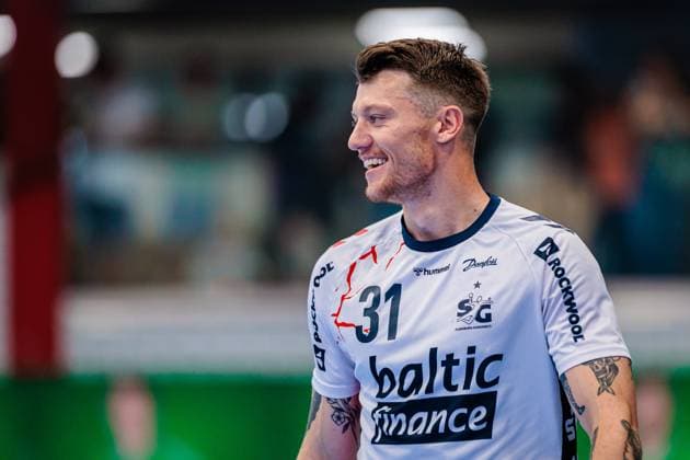 Emil Jakobsen SG Flensburg Handewitt, 31 smiles happy GER, GWD Minden vs SG Flensburg Handewitt, Handball, 1 Bundesliga, Matchday 3, Season 2025 2026, 08 09 2025 GER, GWD Minden vs SG Flensburg Handewitt, Handball, 1 Bundesliga, Matchday 3, Season 2025 2026, 08 09 2025 Luebbecke Copyright: xEibner-Pressefoto JanxRollingerx EP_JSK