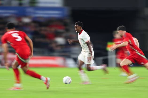 Swansea, Wales, 9th September 2025. Ali Ahmed of Canada breaks with the ball during the Wales vs Canada International Friendly, Länderspiel, Nationalmannschaft match at the Swansea.Com Stadium, Swansea. Picture credit should read: Gareth Evans Sportimage EDITORIAL USE ONLY. No use with unauthorised audio, video, data, fixture lists, club league logos or live services. Online in-match use limited to 120 images, no video emulation. No use in betting, games or single club league player publications. SPI_020_GE_WAL_CAN SPI-4116-0019