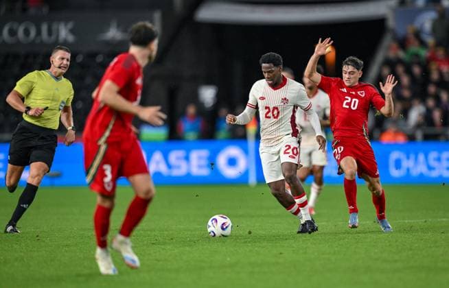 Wales v Canada International Friendly, Länderspiel, Nationalmannschaft Jonathan David of Canada and Daniel James of Wales during the International Friendly match between Wales and Canada at Swansea.com Stadium, Swansea UK Newspapers OUT Copyright: xPaulxRuberyx FIL-22196-0036