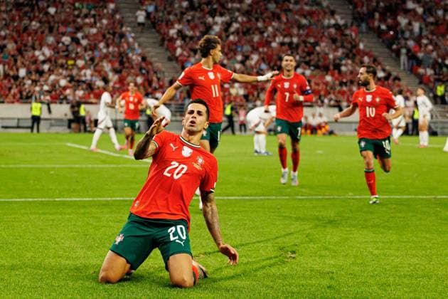 Joao Cancelo seen celebrating after goal during World Cup 2026 European qualification game between national teams of Hungary and Portugal (Maciej Rogowski Ball Raw Images) Budapest Puskas Arena Hungary Copyright: xMaciejxRogowskix maciejrogowski_hungary_portugal2526-03