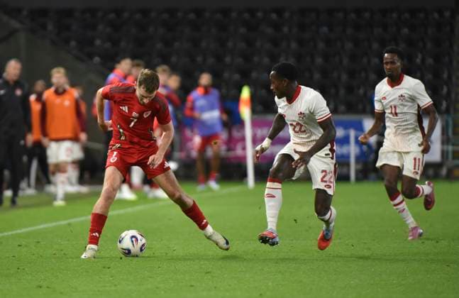 9th September 2025; Swansea.com Stadium, Swansea, Wales; Friendly International Football, Wales versus Canada; David Brooks of Wales being pressured by Richie Laryea of Canada  AledxHopkins