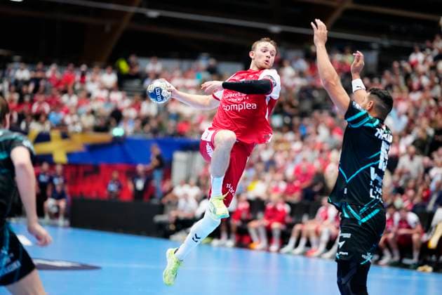 Denmark EHF Champions League Aalborg s Thomas Arnoldsen and Veszprem s Ahmed Hesham during EHF Champions League men s handball match between Aalborg Handball and One Veszprém HC at Sparekassen Danmark Arena in Aalborg on Wednesday, September 10, 2025 Photo Henning Bagger Scanpix 2025 , Aalborg Denmark  Copyright: HenningxBaggerx spdk20250910-194045-L