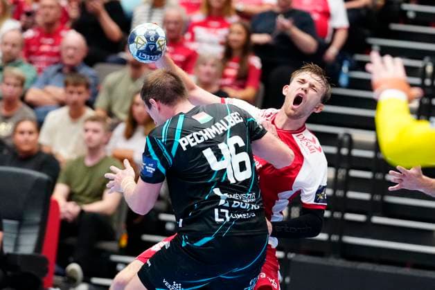 Denmark EHF Champions League Aalborg s Thomas Arnoldsen and Veszprem s Dragan Pechmalbec during EHF Champions League men s handball match between Aalborg Handball and One Veszprém HC at Sparekassen Danmark Arena in Aalborg on Wednesday, September 10, 2025 Photo Henning Bagger Scanpix 2025 , Aalborg Denmark  Copyright: HenningxBaggerx spdk20250910-195101-L