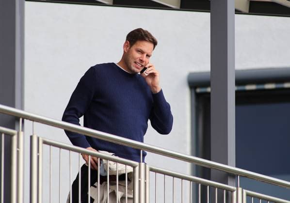 Football, Men, 3 Liga, Season 2025 2026, TSV 1860 Munich, Training Dr Christian Werner, Managing Director Sport TSV 1860 Munich on the phone, cell phone, call