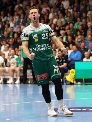 BAU 11 09 2025 Göppingen Handball Frisch Auf Göppingen vs SC DHfK Leipzig, Ludvig Jurmala Aström Göppingen cheers and clenches its fists