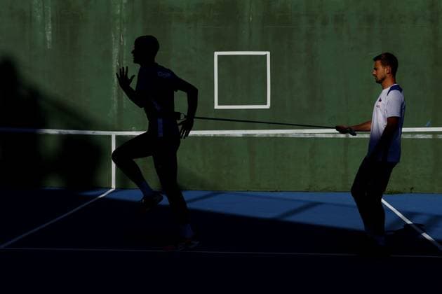 Jakub Mensik and his fitness coach Jan Pospisil during the preparation for the qualifying match between the USA and the Czech Republic for the final group of the Davis Cup 2025 at the Delray Beach Tennis Center in Delray Beach, USA, 11 September 2025. (CTKxPhoto PavelxLebeda) CTKPhotoF202509110010501  CTKPhotoF202509110010501