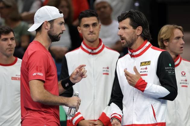 TENNIS - Davis Cup, HUN vs AUT DEBRECEN,HUNGARY,12.SEP.25 - TENNIS - ITF Davis Cup, qualification round 2, Hungary vs Austria. Image shows Jurij Rodionov and captain Juergen Melzer (AUT).  GEPAxpictures xWalterxLuger