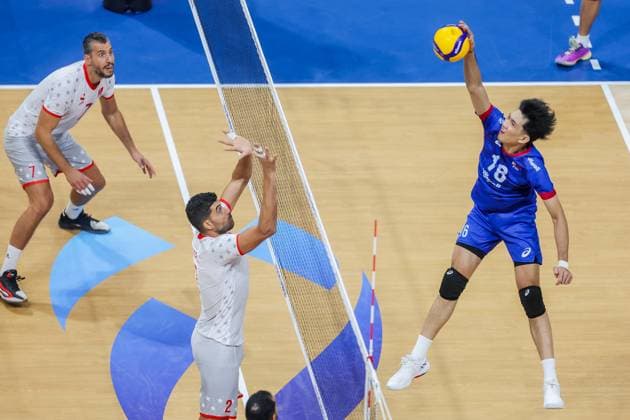 (250912) -- PASAY CITY, Sept. 12, 2025 -- Rwenzmel Taguibolos (R) of the Philippines spikes the ball during the pool A match between Tunisia and the Philippines at the 2025 FIVB Volleyball Men s World Championship, WM, Weltmeisterschaft in Pasay City, the Philippines, Sept. 12, 2025. ) (SP)THE PHILIPPINES-PASAY CITY-VOLLEYBALL-FIVB MEN S WORLD CHAMPIONSHIP-PHL VS TUN RouellexUmali 