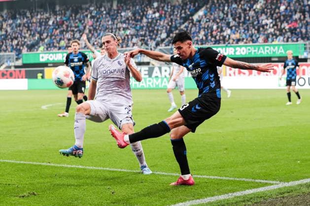 Raphael Obermair SC Paderborn,23 vs Noah Loosli VfL Bochum,20 2 Soccer Bundesliga Season 2025 2026 SC Paderborn vs VfL Bochum at the Home Deluxe Arena in Paderborn Action,Soccer,Man,Men,Germany,12 09 2025