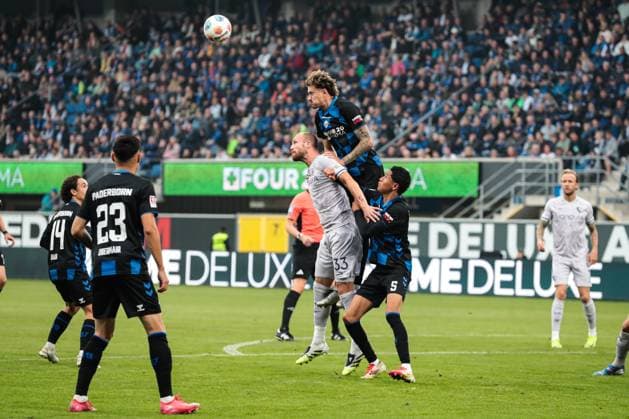 Philipp Hofmann VfL Bochum,33 vs Calvin Brackelmann SC Paderborn,4 2 Soccer Bundesliga Season 2025 2026 SC Paderborn vs VfL Bochum at the Home Deluxe Arena in Paderborn Action,Soccer,Man,Men,Germany,12 09 2025