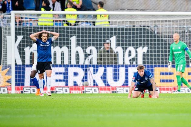 12 09 2025 Soccer, 2025 2026, 2 Bundesliga, 5 Matchday, DSC Arminia Bielefeld 1 FC Magdeburg L R Mael Corboz Bielefeld , Joel Grodowski Bielefeld on the ground DFL REGULATIONS PROHIBIT ANY USE OF PHOTOGRAPHS AS IMAGE SEQUENCES AND OR QUASI VIDEO