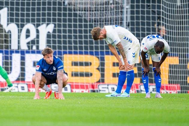12 09 2025 Soccer, 2025 2026, 2 Bundesliga, Matchday 5, DSC Arminia Bielefeld 1 FC Magdeburg L R Joel Grodowski Bielefeld , Marcus Mathisen Magdeburg , Silas Gnaka Magdeburg on the ground DFL REGULATIONS PROHIBIT ANY USE OF PHOTOGRAPHS AS IMAGE SEQUENCES AND OR QUASI VIDEO