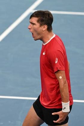 TENNIS DAVIS CUP AUSTRALIA BELGIUM, Raphael Collignon of Belgium celebrates his win over Alex de Minaur of Australia with his team during the Davis Cup qualifying second round match at Ken Rosewall Arena in Sydney, Saturday, September 13, 2025. ( NO ARCHIVING, EDITORIAL USE ONLY SYDNEY NEW SOUTH WALES AUSTRALIA ALBION PARK  Copyright: xDEANxLEWINSx 20250913168313443756