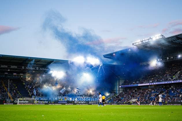 12 09 2025 Soccer, 2025 2026, 2 Bundesliga, 5 Matchday, DSC Arminia Bielefeld 1 FC Magdeburg Fans Magdeburg with pyrotechnics DFL REGULATIONS PROHIBIT ANY USE OF PHOTOGRAPHS AS IMAGE SEQUENCES AND OR QUASI VIDEO
