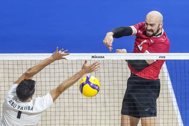 (250913) -- QUEZON CITY, Sept. 13, 2025 -- Nicholas Hoag (R) of Canada competes against Abdelrahman Abu Zariba of Libya during the pool G match between Canada and Libya at the 2025 FIVB Volleyball Men s World Championship, WM, Weltmeisterschaft in Quezon City, the Philippines, Sept. 13, 2025. ) (SP)THE PHILIPPINES-QUEZON CITY-VOLLEYBALL-FIVB MEN S WORLD CHAMPIONSHIP 2025-CAN VS LBA RouellexUmali 