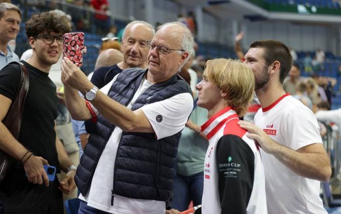 TENNIS - Davis Cup, HUN vs AUT DEBRECEN,HUNGARY,13.SEP.25 - TENNIS - ITF Davis Cup, qualification round 2, Hungary vs Austria. Image shows Lukas Neumayer, Jurij Rodionov (AUT) and fans.  GEPAxpictures xWalterxLuger