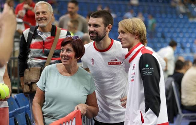 TENNIS - Davis Cup, HUN vs AUT DEBRECEN,HUNGARY,13.SEP.25 - TENNIS - ITF Davis Cup, qualification round 2, Hungary vs Austria. Image shows Jurij Rodionov, Lukas Neumayer (AUT) and fans.  GEPAxpictures xWalterxLuger