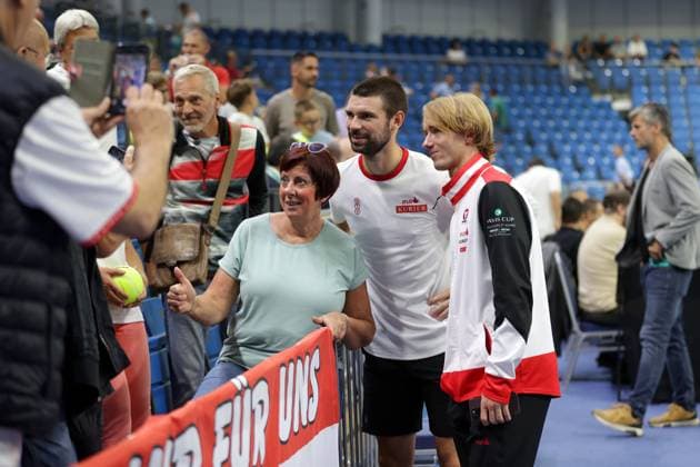 TENNIS - Davis Cup, HUN vs AUT DEBRECEN,HUNGARY,13.SEP.25 - TENNIS - ITF Davis Cup, qualification round 2, Hungary vs Austria. Image shows Jurij Rodionov, Lukas Neumayer (AUT) and fans.  GEPAxpictures xWalterxLuger
