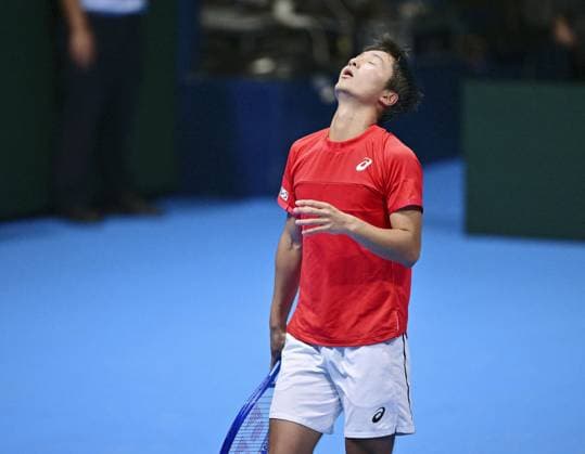 Tennis: Davis Cup Shintaro Mochizuki of Japan reacts after losing to Yannick Hanfmann of Germany in the second round of the Davis Cup team tennis qualifiers at Ariake Colosseum in Tokyo on Set. 12, 2025.  A14AA0004844727P