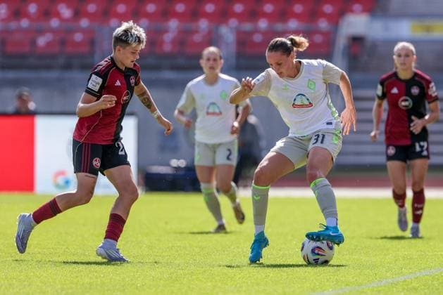 from left Aneta Polaskova 1 FC Nürnberg, 26 and Verena Wieder SV Werder Bremen, 31 in a duel, dynamic, action, action, game scene, THE DFB GUIDELINES PROHIBIT ANY USE OF PHOTOGRAPHS AS IMAGE SEQUENCES AND OR QUASI VIDEO DFB REGULATIONS PROHIBIT ANY USE OF PHOTOGRAPHS AS IMAGE SEQUENCES AND OR QUASI VIDEO , 13 09 2025, Nuremberg Germany , Football, Google Pixel Women Bundesliga, 1 FC Nürnberg SV Werder Bremen xobx