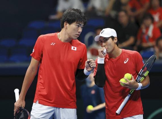 Tennis: Davis Cup Yosuke Watanuki (R) and Takeru Yuzuki of Japan talks during their double match against Kevin Krawietz and Tim Puetz of Germany in the second round of the Davis Cup team tennis qualifiers at Ariake Coliseum in Tokyo on Set. 13, 2025.  A14AA0004844925P