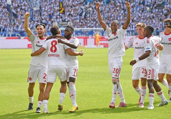 13 09 2025, xhbx, Fußball 2 Bundesliga, Karlsruher SC 1 FC Nürnberg v l Torjubel, Goal celebration, celebrate the goal 1 1 durch Henri Koudossou 1 FC Nuernberg DFL DFB REGULATIONS PROHIBIT ANY USE OF PHOTOGRAPHS as IMAGE SEQUENCES and or QUASI VIDEO Karlsruhe
