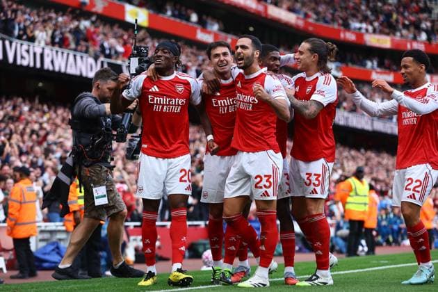Martin Zubimendi of Arsenal celebrates scoring the opening goal with team-mates Arsenal v Nottingham Forest, Premier League, Football, Emirates Stadium, London, UK - 13 Sept 2025London Emirates Stadium United Kingdom EDITORIAL USE ONLY No use with unauthorised audio, video, data, fixture lists, club league logos or live services. Online in-match use limited to 120 images, no video emulation. No use in betting, games or single club league player publications. Copyright: xMichaelxZemanek Shutterstockx 15481272aa