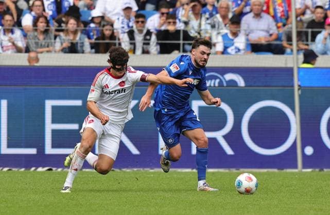 13 09 2025 Soccer Season 2025 2026 2 Soccer Bundesliga 05 Matchday Karlsruher SC KSC 1 FC Nürnberg FCN Club Sportfoto Zink DaMa xdaxmax DFL regulations prohibit any use of photographs as image sequences and or quasi video only for editorial use Fabio Gruber 4, 1 FC Nürnberg FCN Lilian Egloff 25, Karlsruher SC KSC