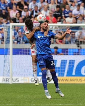 13 09 2025 Soccer season 2025 2026 2 Soccer Bundesliga 05 Matchday Karlsruher SC KSC 1 FC Nuremberg FCN Club Sportfoto Zink DaMa xdaxmax DFL regulations prohibit any use of photographs as image sequences and or quasi video only for editorial use Fabio Gruber 4, 1 FC Nuremberg FCN in header duel with Fabian Schleusener 24, Karlsruher SC KSC