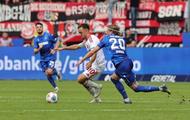 13 09 2025 Soccer Season 2025 2026 2 Soccer Bundesliga 05 Matchday Karlsruher SC KSC 1 FC Nürnberg FCN Club Sportfoto Zink DaMa xdaxmax DFL regulations prohibit any use of photographs as image sequences and or quasi video only for editorial use Julian Justvan 10, 1 FC Nürnberg FCN David Herold 20, Karlsruher SC KSC