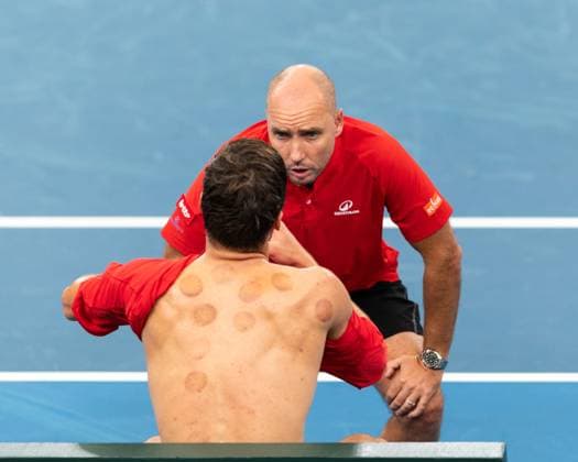 September 13, 2025, Sydney, Nsw, Australia: STEVE DARCIS, BelgiumÃ¢â‚¬â ¢s captain, talks to RAPHAEL COLLIGNON during a changeover in the Davis Cup tie between Australia and Belgium Sydney Australia - ZUMAt173 20250913_zsp_t173_007 Copyright: xStephanexThomasx