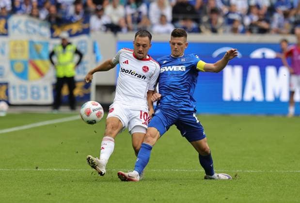 13 09 2025 Soccer Season 2025 2026 2 Soccer Bundesliga 05 Matchday Karlsruher SC KSC 1 FC Nürnberg FCN Club Sportfoto Zink DaMa xdaxmax DFL regulations prohibit any use of photographs as image sequences and or quasi video only for editorial use Julian Justvan 10, 1 FC Nürnberg FCN Marvin Wanitzek 10, Karlsruher SC KSC