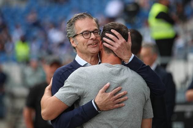 Warm hug from Holger Siegmund Schultze Karlsruher SC, President Christian Eichner Karlsruher SC, Head Coach , GER, Karlsruher SC vs 1 FC Nuernberg, 2 Bundesliga, 5 Matchday, 2025 2026, 13 09 2025, DFL REGULATIONS PROHIBIT ANY USE OF PHOTOGRAPHS AS IMAGE SEQUENCES AND OR QUASI VIDEO, GER, Karlsruher SC vs 1 FC Nuernberg, 2 Bundesliga, 5 Matchday, 2025 2026, 13 09 2025 Karlsruhe Copyright: xEibner-Pressefoto JanxPrihodax EP_JPA