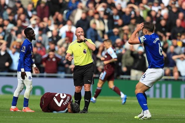13th September 2025; Hill Dickinson Stadium, Liverpool, England; Premier League Football, Everton versus Aston Villa; James Tarkowski of Everton reacts after a free kick is awarded against him for a foul on Morgan Rogers of Aston Villa by referee Simon Hooper  DavidxBlunsden