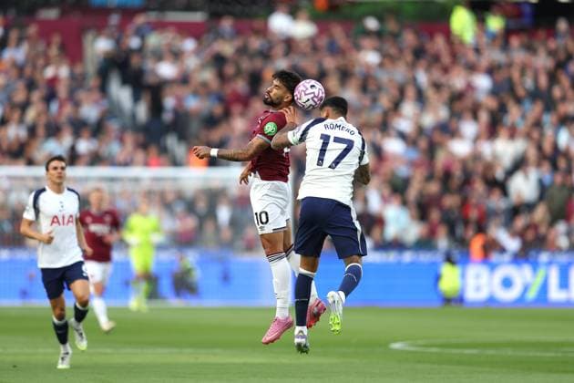 13th September 2025; London Stadium, London, England; Premier League Football, West Ham United versus Tottenham Hotspur; Lucas Paqueta of West Ham United heads the ball above Cristian Romero of Tottenham Hotspur  JohnxPatrickxFletcher