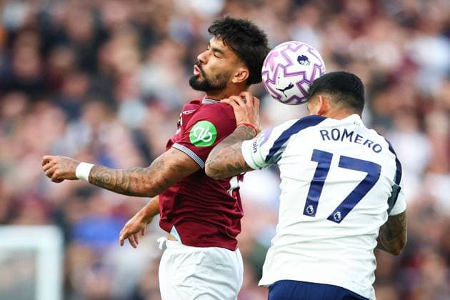 Lucas Paqueta of West Ham United and Cristian Romero of Tottenham Hotspur battle for the ball West Ham United v Tottenham Hotspur, Premier League, Football, London Stadium, London, UK - 13 Sept 2025London London Stadium United Kingdom EDITORIAL USE ONLY No use with unauthorised audio, video, data, fixture lists, club league logos or live services. Online in-match use limited to 120 images, no video emulation. No use in betting, games or single club league player publications. Copyright: xSimonxDael Shutterstockx 15481313k