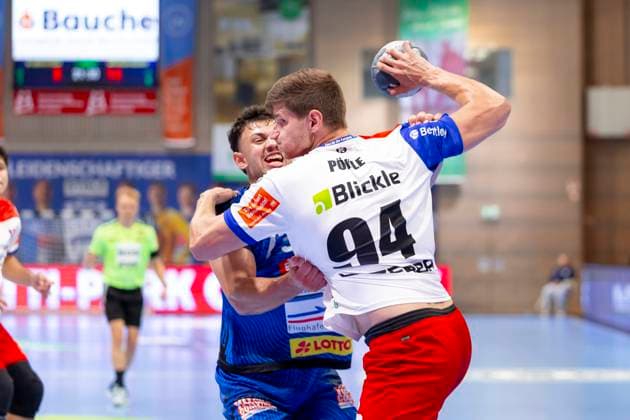 Lukas Kingsley Emdorf Nr 73, VfL Luebeck Schwartau vs Georg Pöhle Nr 94, HBW Balingen Weilstetten VfL Luebeck Schwartau vs HBW Balingen Weilstetten, Handball, 2 Bundesliga, 13 09 25 Luebeck Schleswig Holstein Germany Copyright: xAgentur54Gradx xFelixxKoenigx