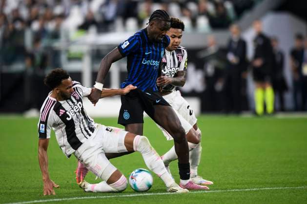 Juventus FC v FC Internazionale - Serie A Marcus Thuram of FC Internazionale competes for the ball with Lloyd Kelly and Weston McKennie of Juventus FC during the Serie A football match between Juventus FC and FC Internazionale. Turin Italy Copyright: xNicolòxCampox