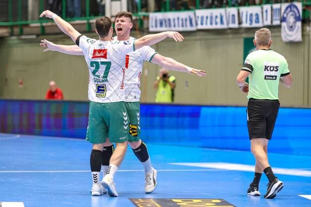 13 09 2025, Handball, HBL, Bergischer HC TSV GWD Minden, Unihalle Wuppertal Cheering after the 30 23 victory Max Staar GWD Minden 27 and Philipp Vorlicek GWD Minden 22 North Rhine-Westphalia Germany