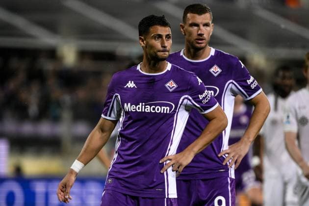 Rolando Mandragora and Edin Dzeko of ACF Fiorentina during the Serie A football match between ACF Fiorentina and SSC Napoli at Artemio Franchi stadium in Florence (Italy), September 13, 2025. andreaxstaccioli
