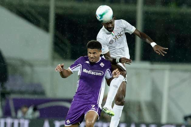 Serie A football match Fiorentina vs SSC Napoli Napoli s Cameroonian midfielder Andre Frank Zambo Anguissa challenges for the ball with Fiorentina s Swiss midfielder Simon Sohm during the Serie A football match Fiorentina vs SSC Napoli at Artemio Franchi Stadium on September 13, 2025, in Florence. _BPH5341 Copyright: xAntonioxBalascox