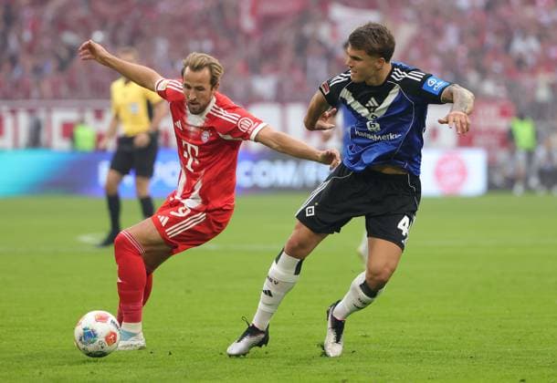 (250914) -- MUNICH, Sept. 14, 2025 -- Harry Kane (L) of Bayern Munich vies with Luka Vuskovic of Hamburger SV during the German first division Bundesliga football match between Bayern Munich and Hamburger SV at Allianz Arena in Munich, Germany, Sept. 13, 2025. (Photo by Xinhua) (SP)GERMANY-MUNICH-FOOTBALL-BUNDESLIGA-BAYERN MUNICH VS HAMBURGER SV PhilippexRuiz 