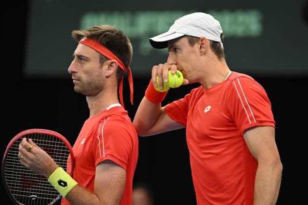 TENNIS DAVIS CUP AUSTRALIA BELGIUM, A dejected Sander Gille and Joran Vliegen of Belgium during their loss to Rinky Hijikata and Jordan Thompson of Australia during the Davis Cup qualifying second round doubles match at Ken Rosewall Arena in Sydney, Sunday, September 14, 2025. ( NO ARCHIVING, EDITORIAL USE ONLY SYDNEY NEW SOUTH WALES AUSTRALIA ALBION PARK  Copyright: xDEANxLEWINSx 20250914167826418323
