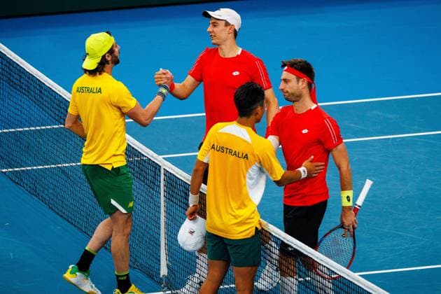 Australian Jordan Thompson, Belgian Joran Vliegen, Australian Rinky Hijikata, Belgian Sander Gille, shake hands after and a a tennis match between Belgian Vliegen Gille and Australian Hijikata Thompson, during the qualifier of the Davis Cup, Sunday 14 September 2025, in Sydney, Australia. Belgium and Australia will compete this weekend in the second round of the Davis Cup qualifiers. PATRICKxHAMILTON  x134194002x