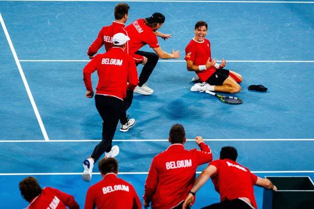 Belgian Raphael Collignon and celebrates with his team after winninga a tennis match between Belgian Collignon and Australian Thompson, during the qualifier of the Davis Cup, Sunday 14 September 2025, in Sydney, Australia. Belgium and Australia will compete this weekend in the second round of the Davis Cup qualifiers. PATRICKxHAMILTON  x134207882x